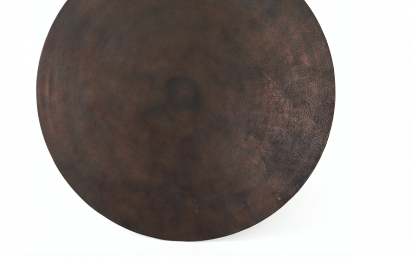 TulipTable in textural cast-aluminum makes for a modern bistro table. Finished in antique rust. Great indoors or out