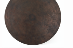 TulipTable in textural cast-aluminum makes for a modern bistro table. Finished in antique rust. Great indoors or out